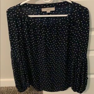 Navy and white polka dot blouse